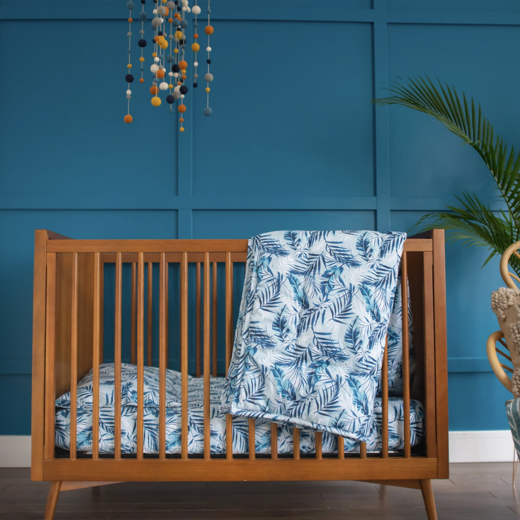 Pottery barn mid century mini crib sales